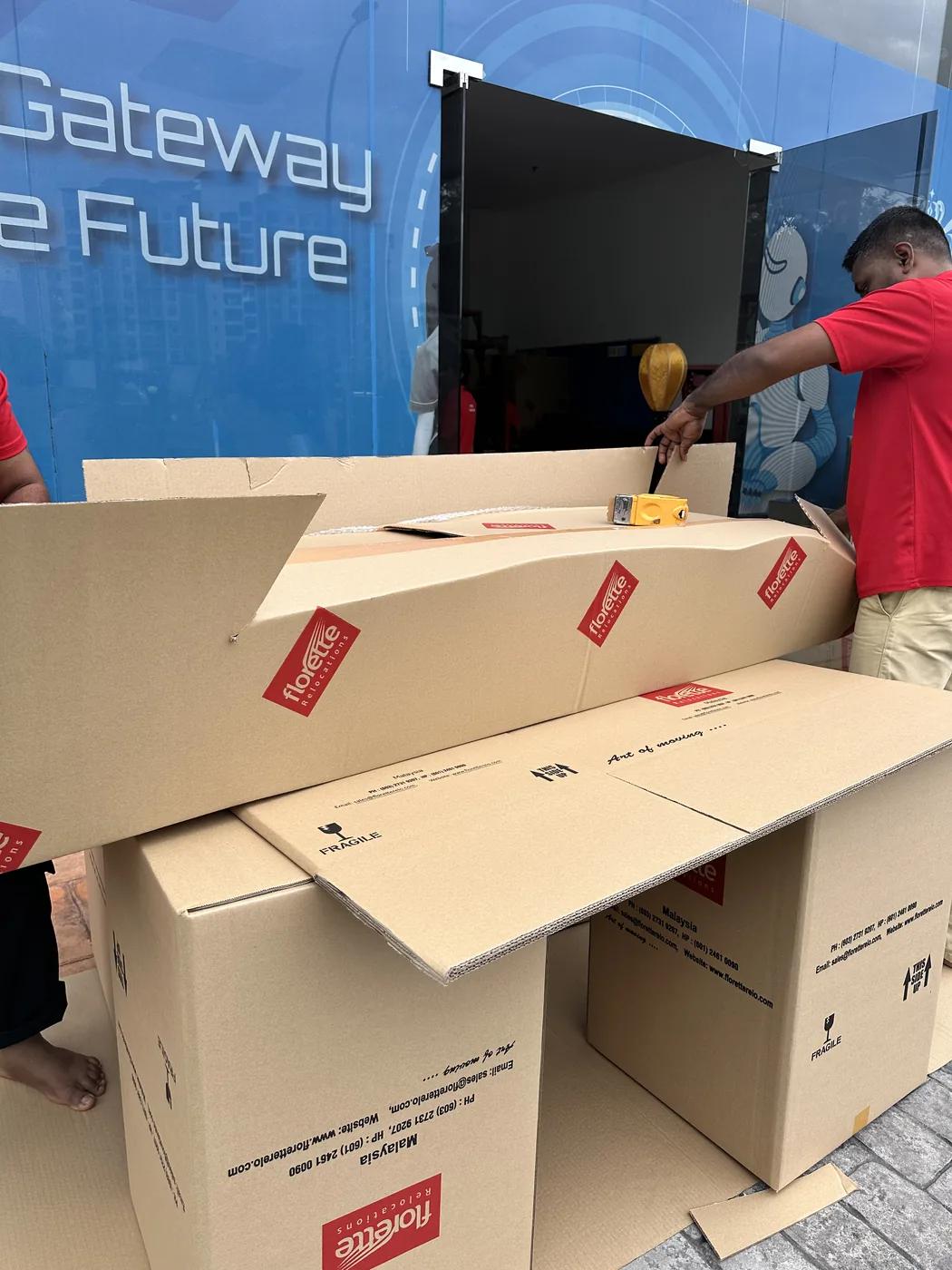 Loading packed goods into shipping container
