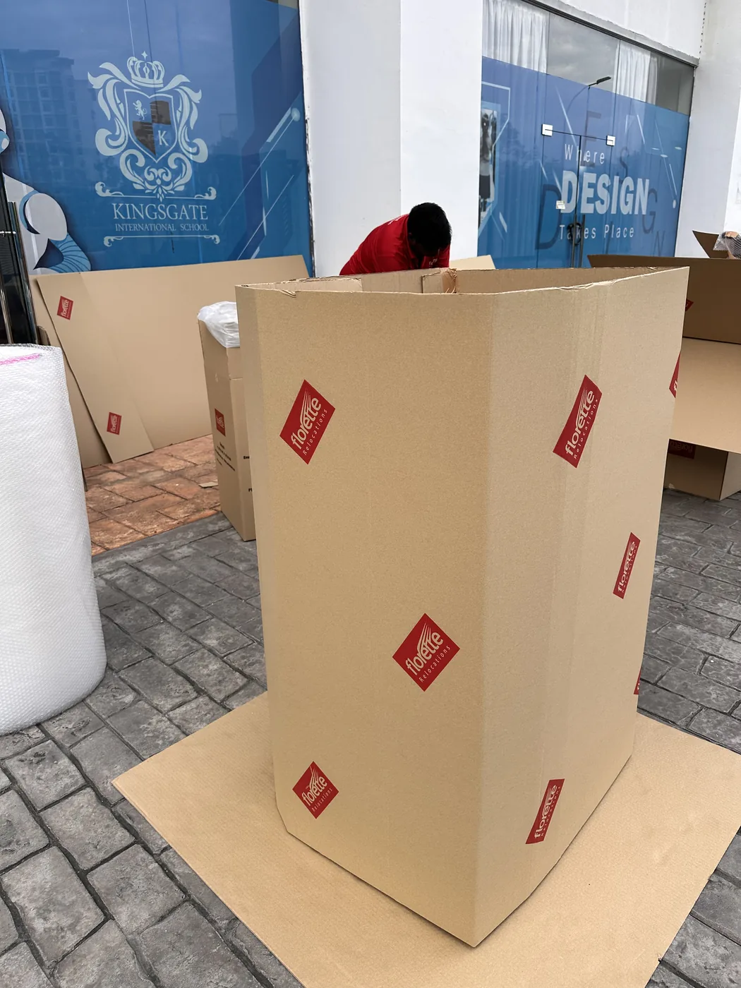 Careful wrapping of fragile valuables for relocation