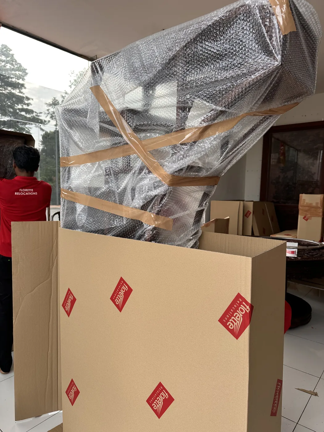 Final preparation of packed shipment for door-to-door delivery