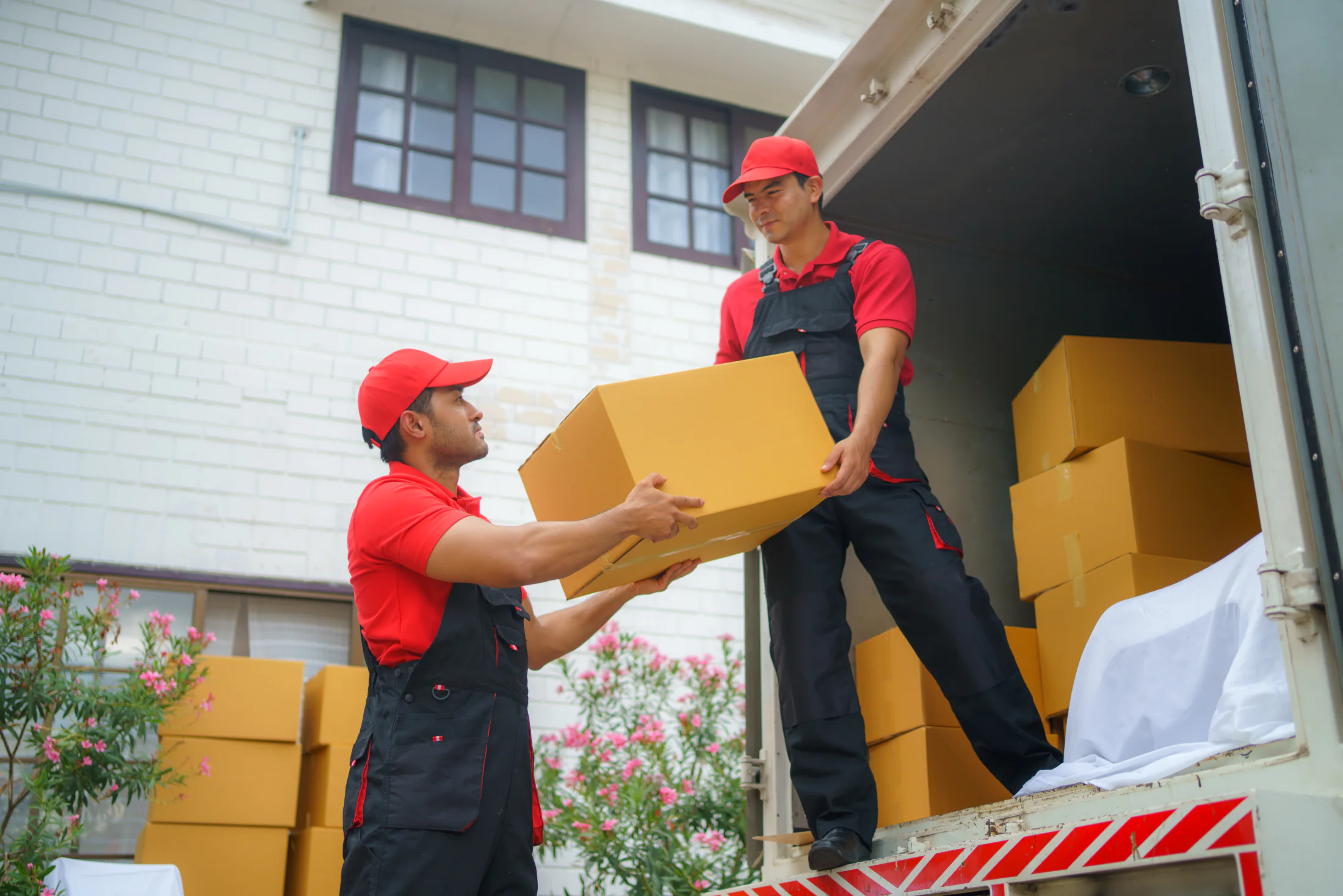Professional local couriers delivering packages to customers for domestic moves in Malaysia